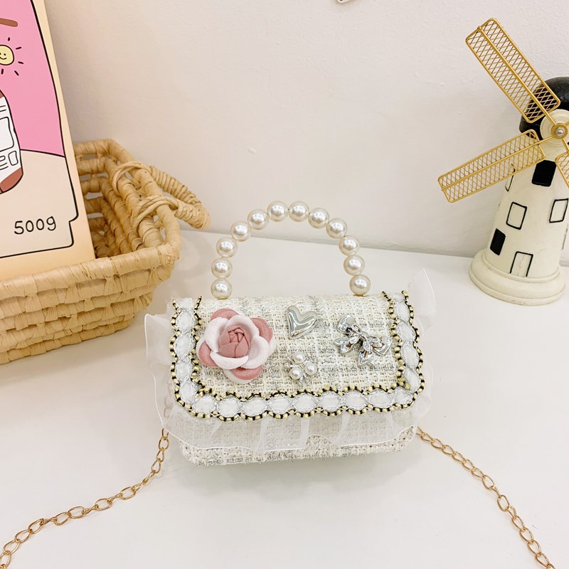 Bolsa de hombro coreana para niñas, arco de perlas, lindas flores, bolso de mochila para bebés, nuevo tipo de bolso para niños fragante.