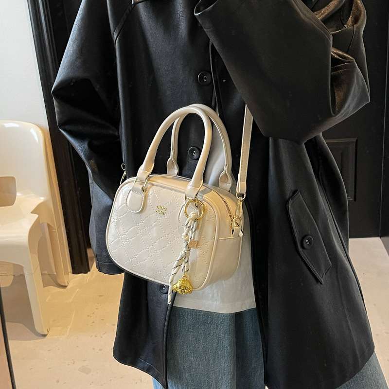 Este año, la popular explosión de bolsos de mano para mujeres 2025, nueva moda universal, bolsos de hombro, bolsos de béisbol de moda de textura