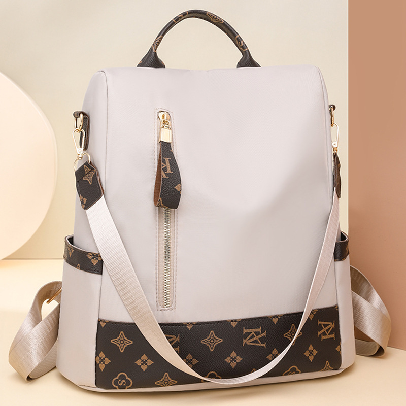 Transfronterizo al por mayor 2024 verano nuevo estilo coreano damas mochila antirrobo moda salvaje mochila de viaje de gran capacidad