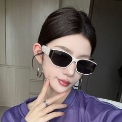 25 新しい男性と女性のカップルサングラス抗 UV レトロハイエンド曲面スクリーンデザインキャットアイサングラス
