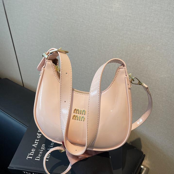 Bolsos de axila de nicho de moda para mujer 2025 nuevo bolso de bola de masa de cercanías con textura versátil, bolso de hombro de alta gama