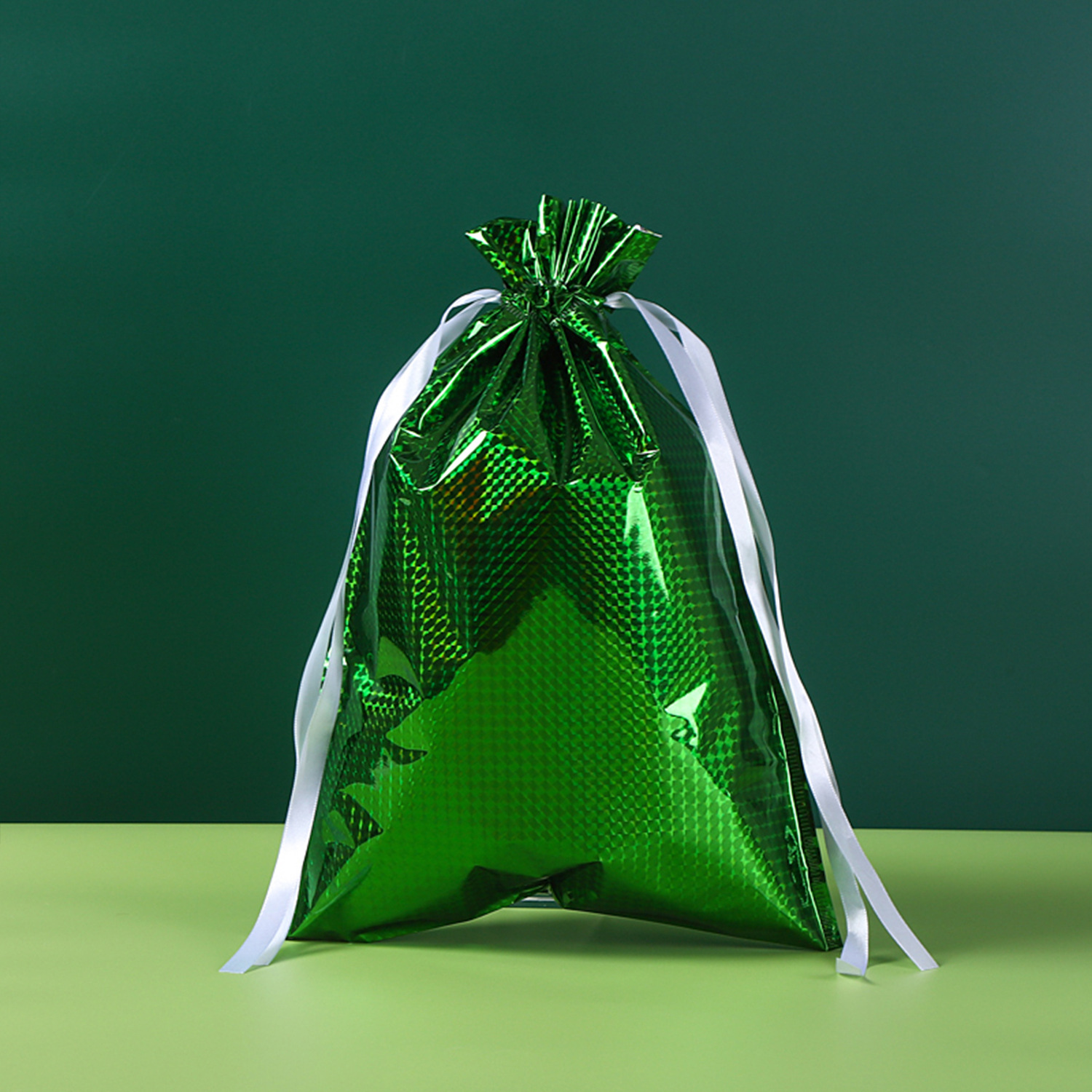 Inventario de cinta de cuerda de dibujo bolsas de dulces de plástico bolsas de regalo frescas bolsas de láser bolsas de regalo Navidad