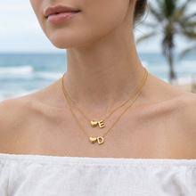 �F؛���Q�羳18K���P��Ʒ���26��ĸ���ĵ����i�������