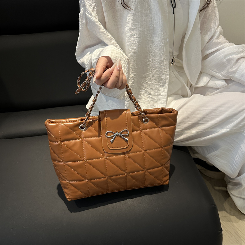 Bolso de hombro de cadena de moda con lazo de gran capacidad para el trabajo para mujer 2025 verano nuevo bolso de nicho