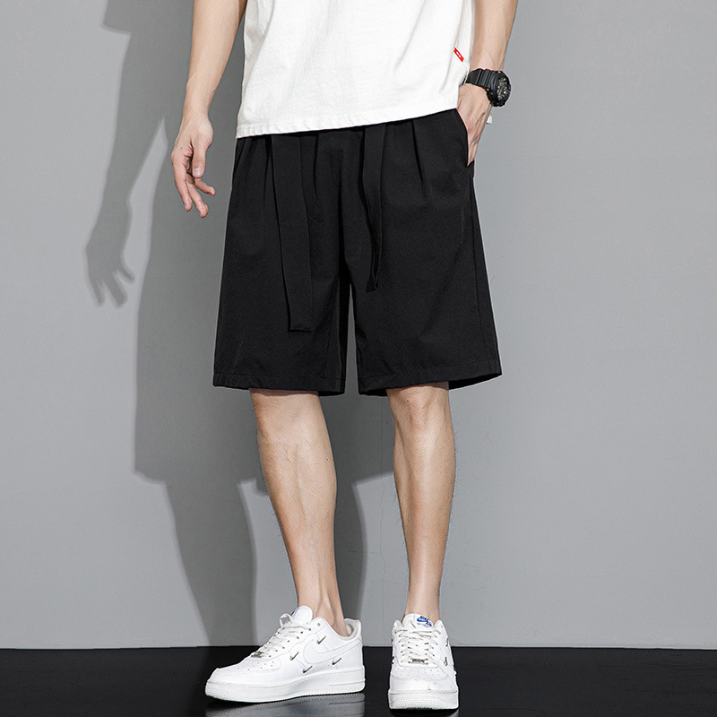 Pantalones cortos de moda de verano masculinos sueltos de color sólido, pantalones deportivos casuales de cinco puntos, pantalones grandes delgados de estilo de Hong Kong