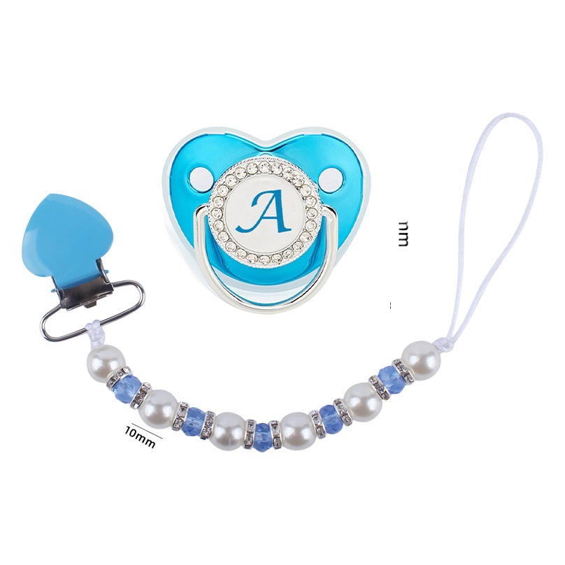 Nuevo bebé suministros melocotón corazón clip de hierro calmante bebé perla cristal chupete cadena anti-gota cadena chupete traje