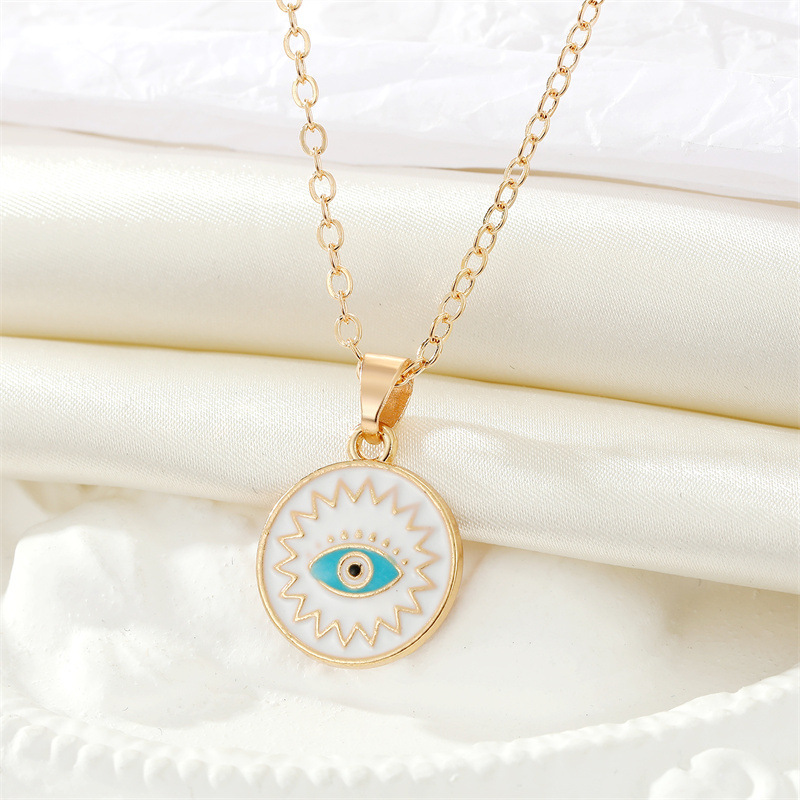 retro ethnic color drop oil Turkish devil eye palm pendant metal necklace