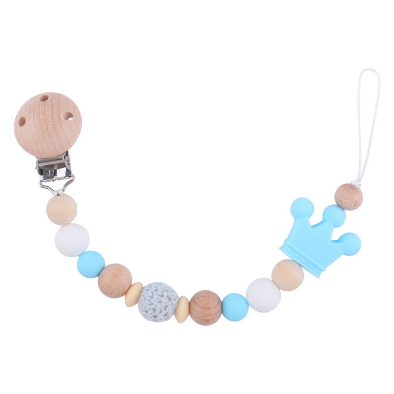 Nuevo bebé suministros Beech chupete clip DIY corona de dibujos animados mordedura de silicona molares chupete cadena anti-caída