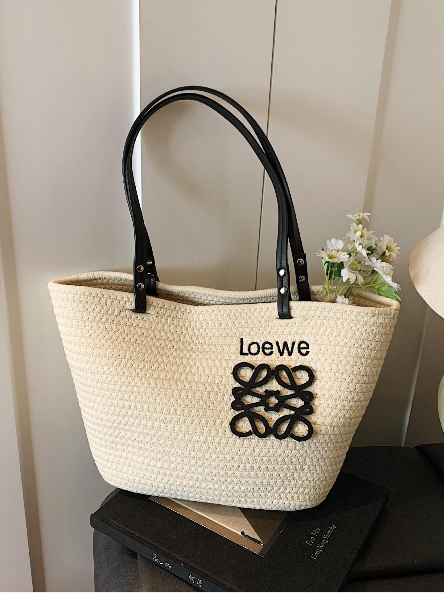 Bolso tejido femenino de gran capacidad 2025 verano nuevo bolso de playa de vacaciones junto al mar estilo de viaje bolso tejido de paja portátil