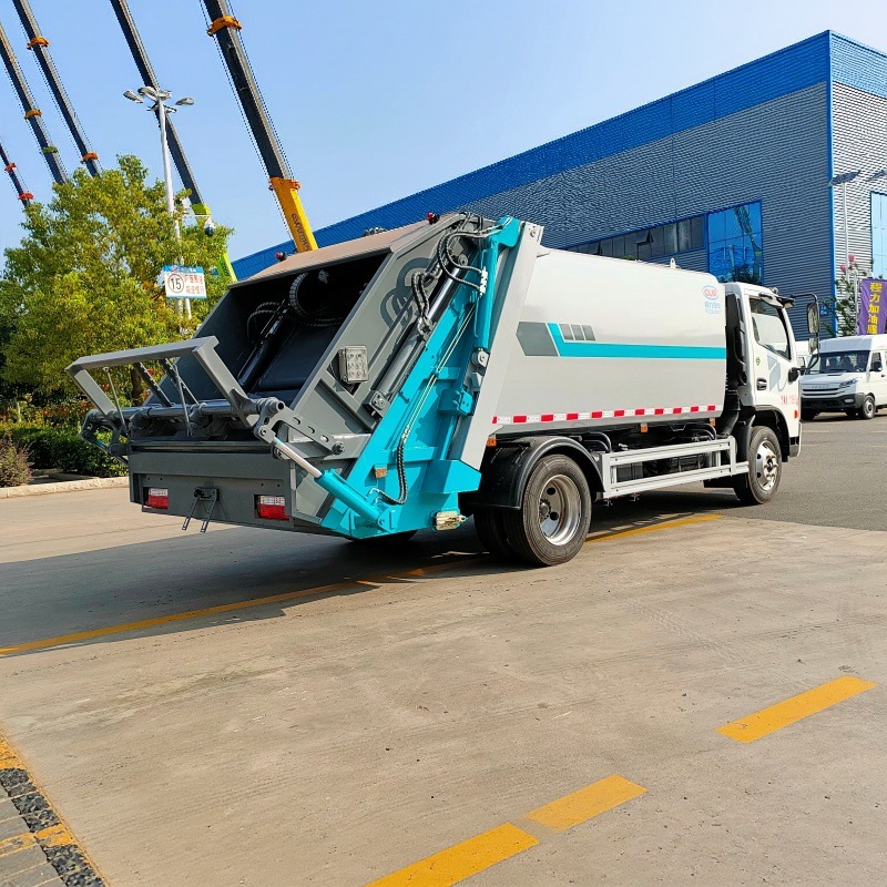 Pure electric compression garbage truck with a fully sealed, leak-proof body, designed for sanitary waste collection, compaction, and transportation