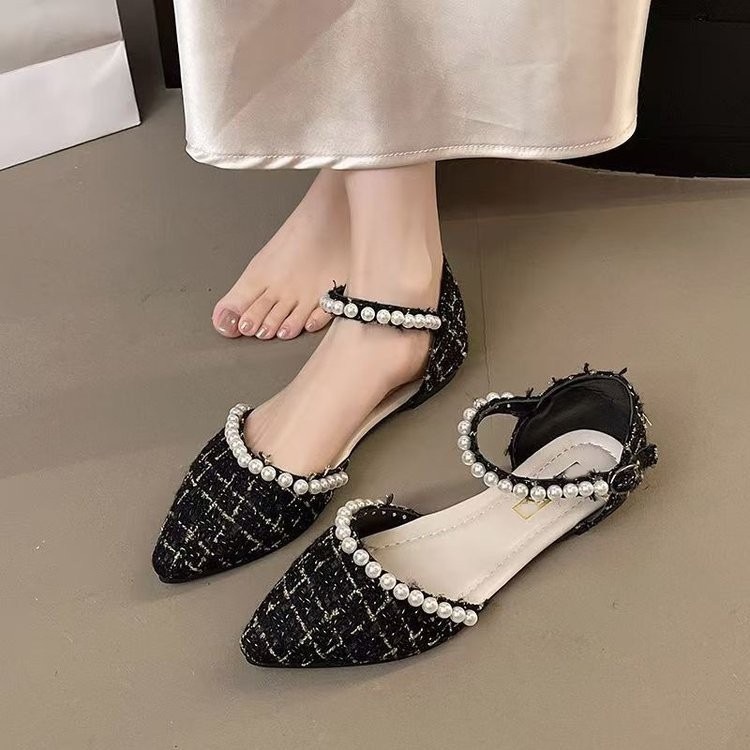 Baotou sandalias para mujeres 2026 nuevo verano en línea Fairy estilo de perla francesa punta plana con falda zapatos individuales