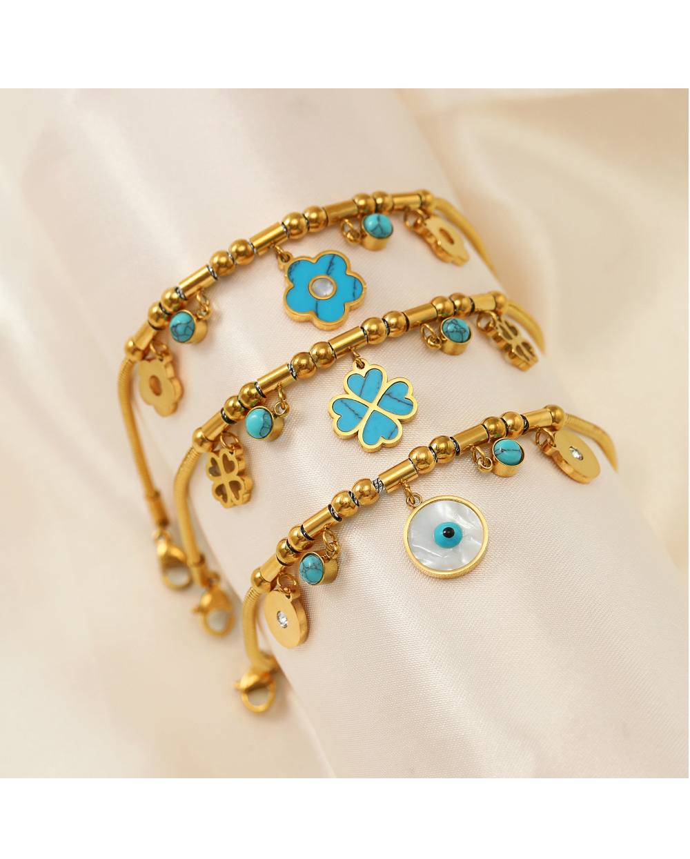 Retro Four Leaf Clover Eye Flower Stainless Steel Gold Plated Turquoise Bracelets display picture 6