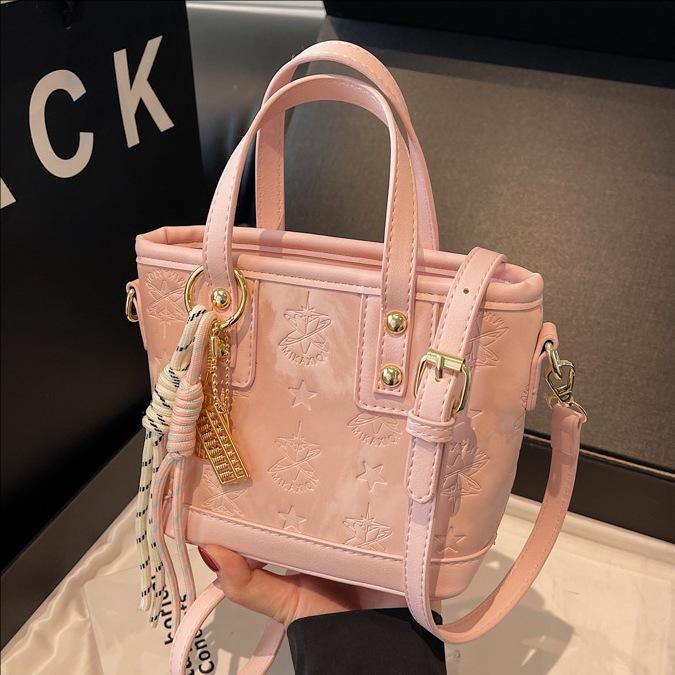 Bolso de mano/bucket bag de moda coreana 2025 para mujer, diseño con relieve, textura de alta gama, versátil, también cruzado
