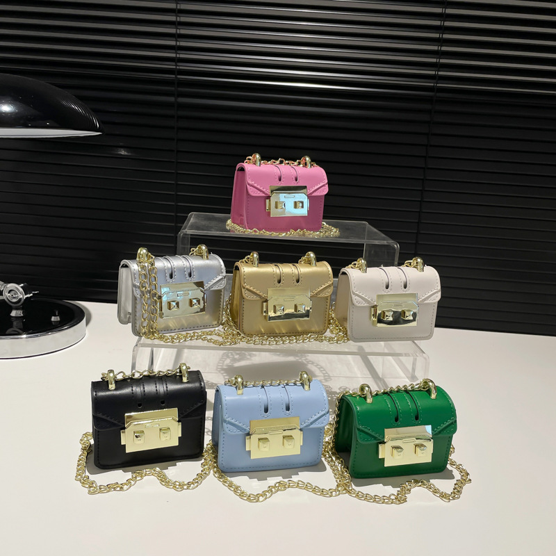 2024 principios de otoño nueva cadena de viaje bolso pequeño nicho personalidad ins cadena de hombro mini bolsa de cambio