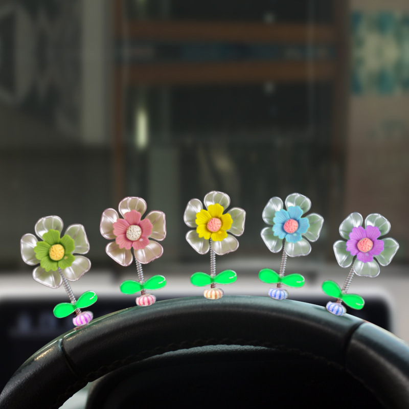 Decoraciones de automóviles 2023 nueva consola central de flores de conchas frescas sacude la cabeza adorable decoración de flores pequeñas