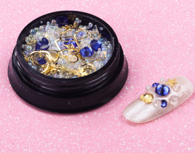 Joyas de belleza de uñas de la estrella y la luna, remaches de estampado de oro, bolas de acero mezcladas con anillo de metal, diamante de agua, diafragma de aleación hueca japonesa