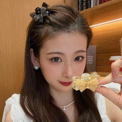 Ab面のかわいい蝶結びのヘアピンのネットは軽くて豪華です。