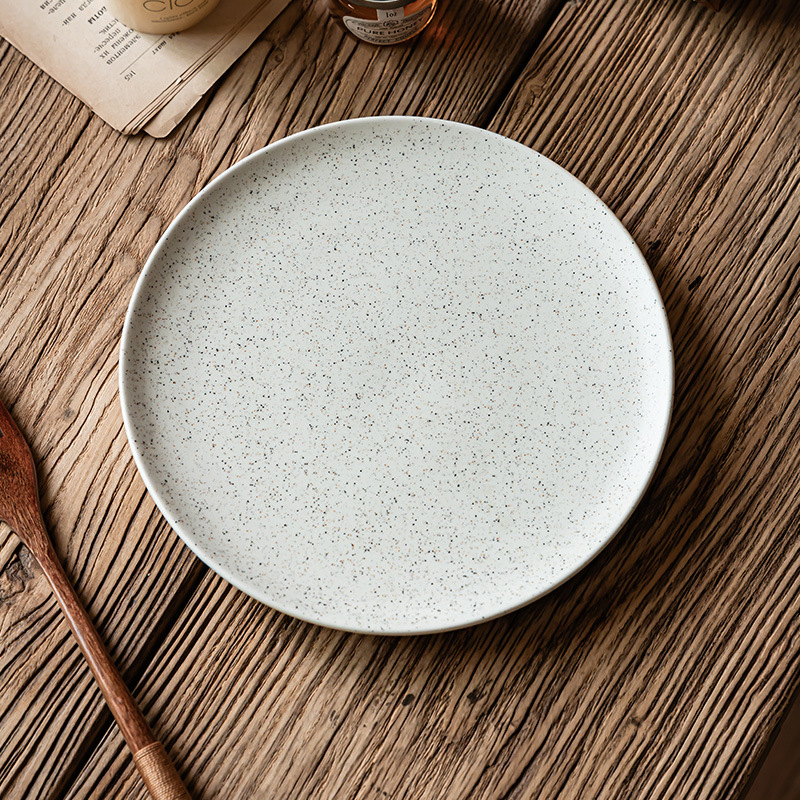 Plato de cerámica esmalte de sésamo retro platos de comedor occidentales platos de cubierta domésticos platos redondos al por mayor platos de postres platos de desayuno platos