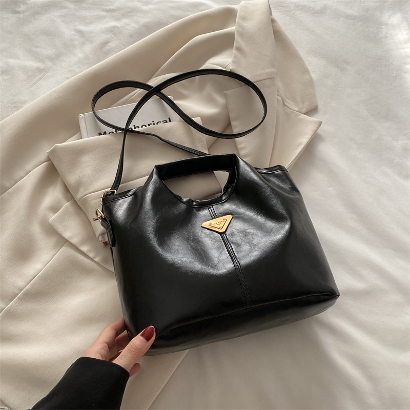 Otoño y invierno coreanos de alta calidad retro aceite de cera de cuero de moda bolso de mano nuevo estilo simple viaje mochila bolso de hombro