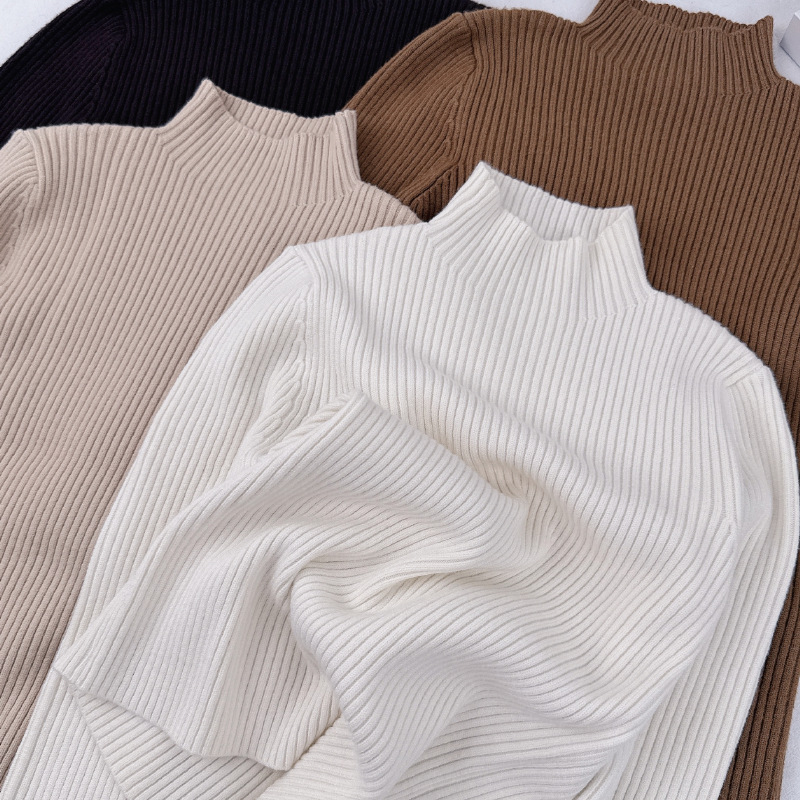 2025 otoño e invierno nuevos productos versión coreana de cuello medio alto elástico suéter para niños camisa de fondo de estilo occidental salvaje suéter de punto para niños