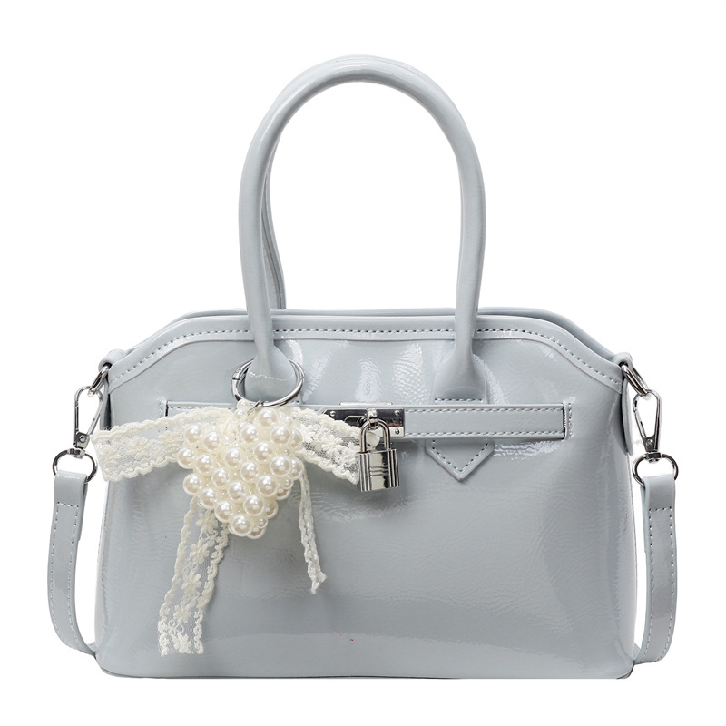 Bolso de concha de moda de verano transfronterizo para mujer 2025 nuevo bolso de hombro de estilo occidental de todo fósforo bolso de mensajero de moda de alta gama