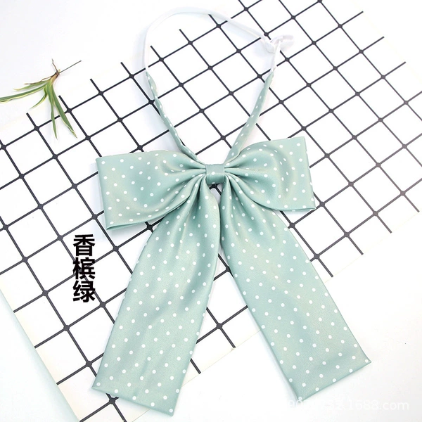 White dots on light green background