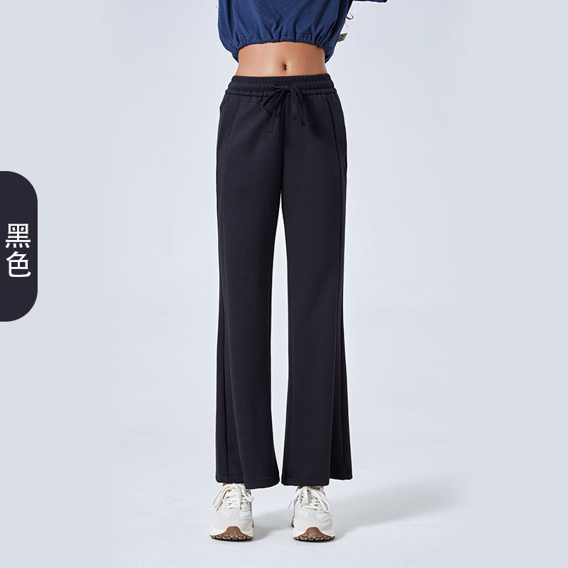 Otoño y invierno nuevo aire de algodón suelto pantalones deportivos simples de mujer cuerda delgada pantalones de yoga de doble bolsillo