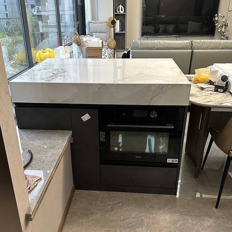 Ventana mirador, plataforma de isla única, mesa de comedor contra la pared, gabinete integrado, losa de roca multifuncional, plataforma de guía central separada, venta directa de fábrica de piedra de lujo