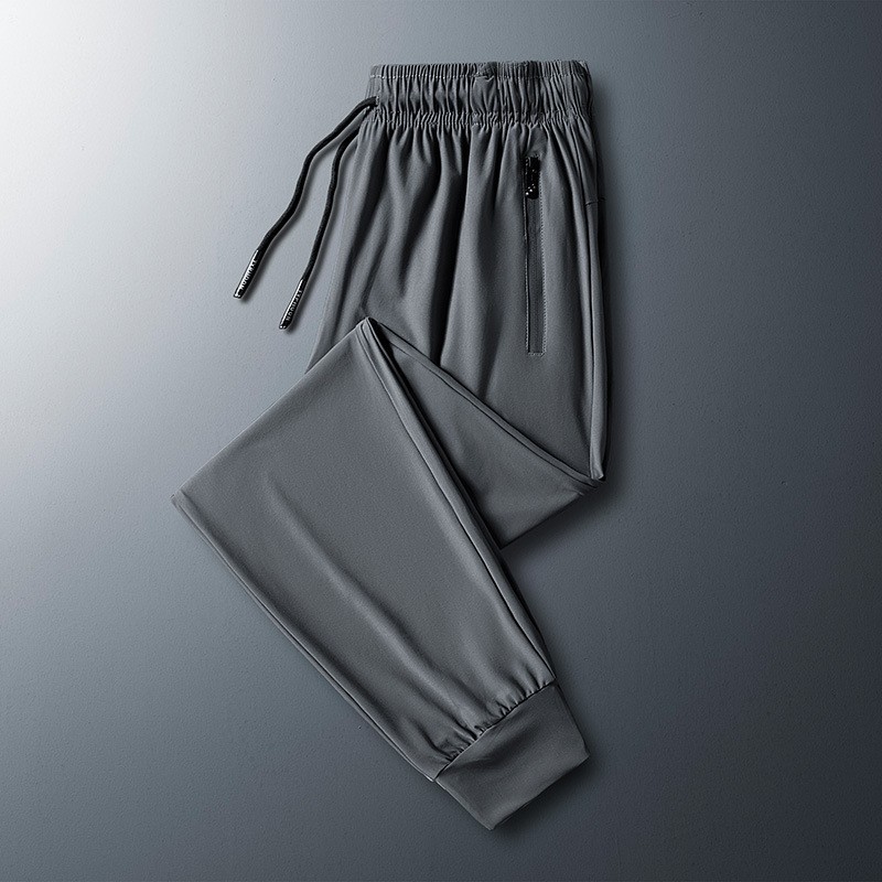 2024 pantalones de seda de hielo pantalones casuales deportivos elásticos finos de verano para hombres pantalones de secado rápido con aire acondicionado de talla grande sueltos y gordos