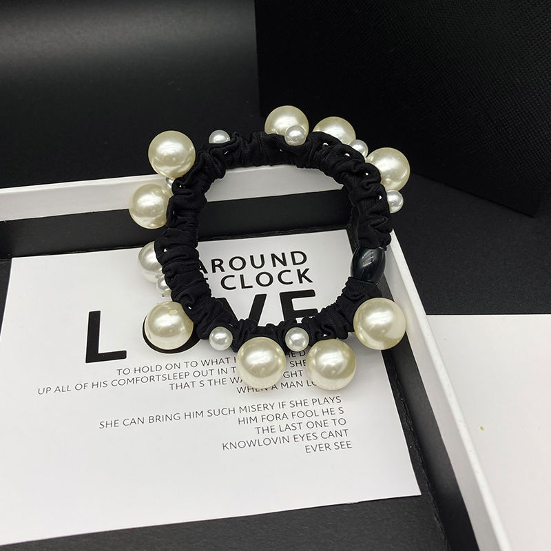 2025 nuevo estilo de cuerda de cabeza simple anillo de pelo de perlas anillo de intestino grande temperamento de alta elasticidad correa gruesa cuerda de pelo de mujer