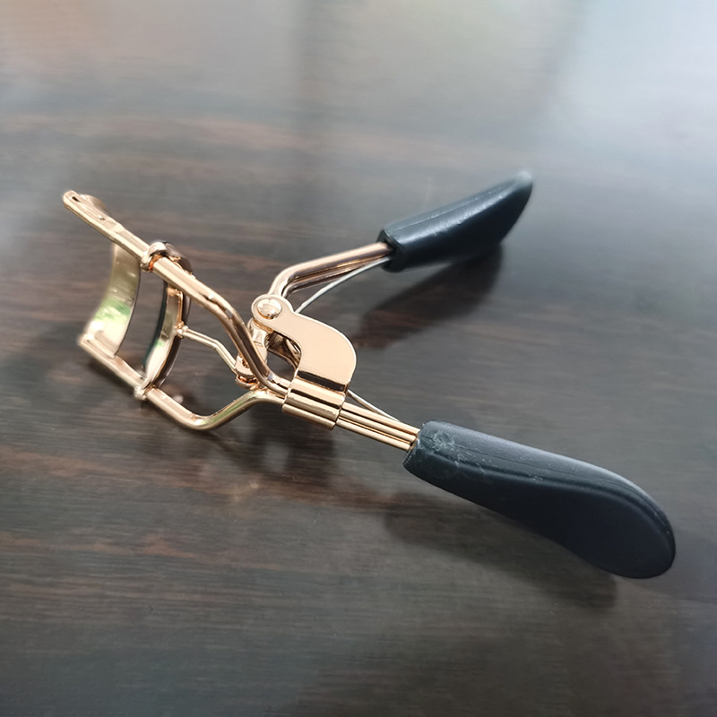 Mango de lengua de pato herramientas de belleza portátiles pestañas falsas dispositivo auxiliar regular rizador de pestañas maquillaje de mujeres en stock al por mayor