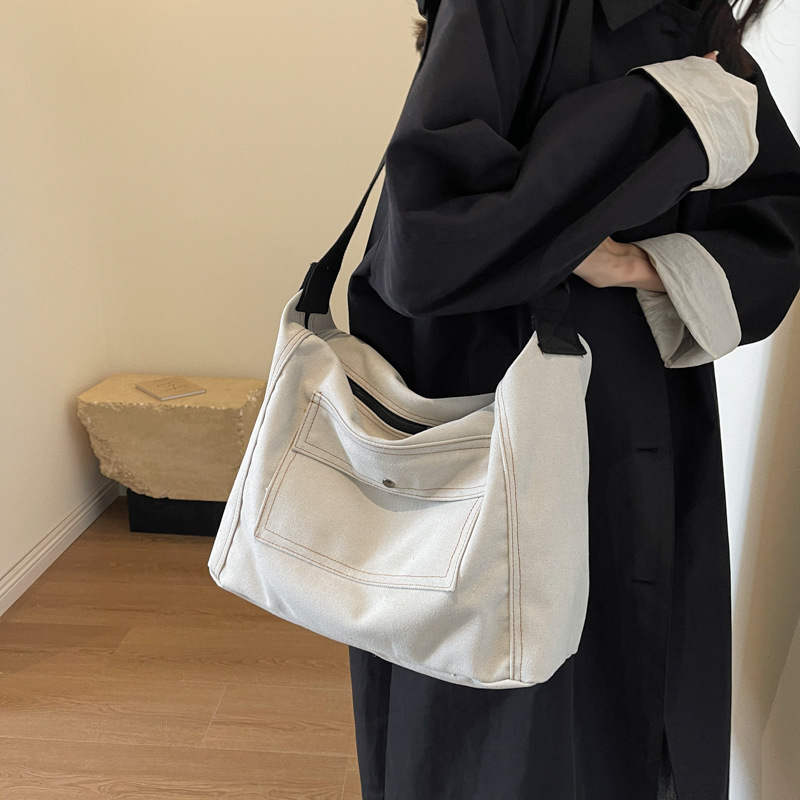 Bolso de lona de gran capacidad simple japonés bolso de mensajero coreano para mujer 2024 nuevo bolso de mensajero de un solo hombro de tendencia casual