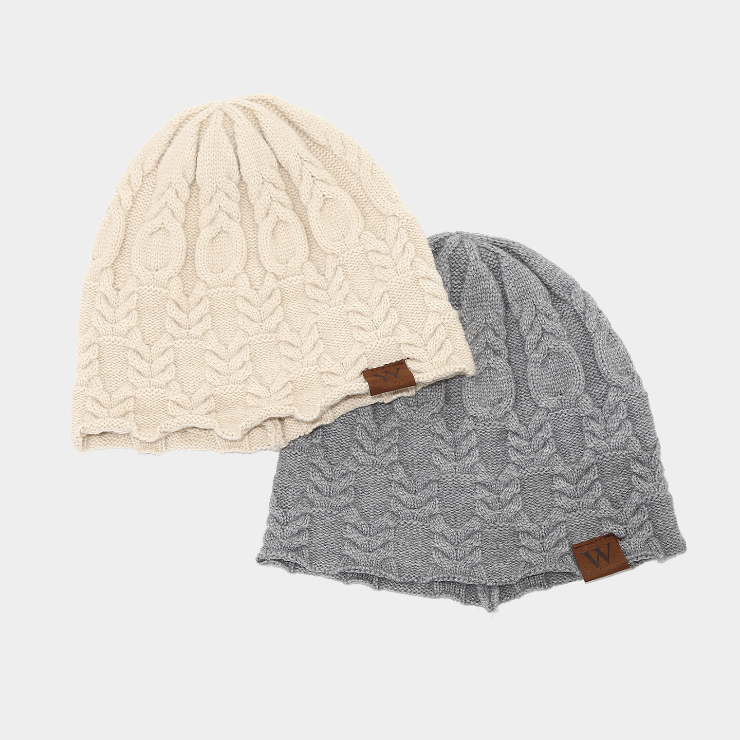 Transfronterizos sombrero de mujer otoño y invierno ocio al aire libre W cuero etiqueta torsión gorra de protector de orejas gorra de punto caliente retro