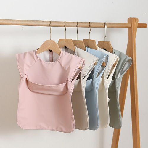 Danish children's sleeveless pu reverse-dressing baby eating clothes bib super soft waterproof solid color rice pocket anti-dirty feeding clothes