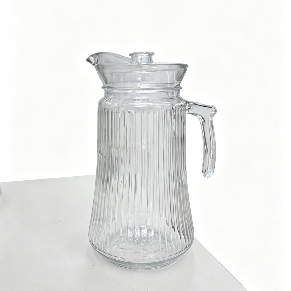 Fábrica directa de agua corrugada de vidrio fría jarro de jugo jarro de agua vertical jarro de boca de pato de gran capacidad