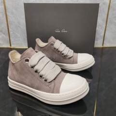 新型のroカーキ色の低いブロードバンドの男性の靴の牛の反絨毯のレジャーの潮流の小さい大衆のファッションの百合の女性の靴のカップルの金