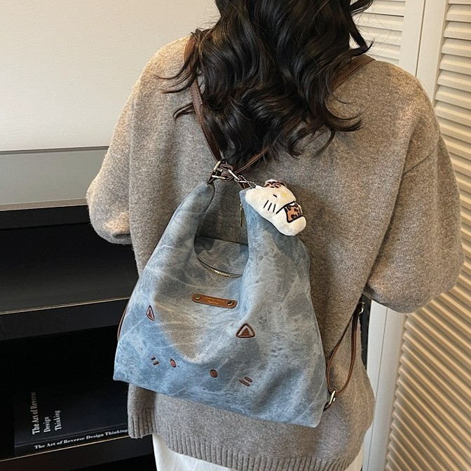 Coreano lindo gato de dibujos animados mochila de hombro de mujer mochila casual de gran capacidad de tres usos de la moda de la mochila de viaje