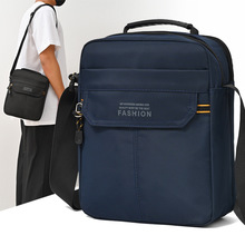 单肩斜挎包新款通勤休闲牛津布包旅行商务小挎包黑色多隔层男包
