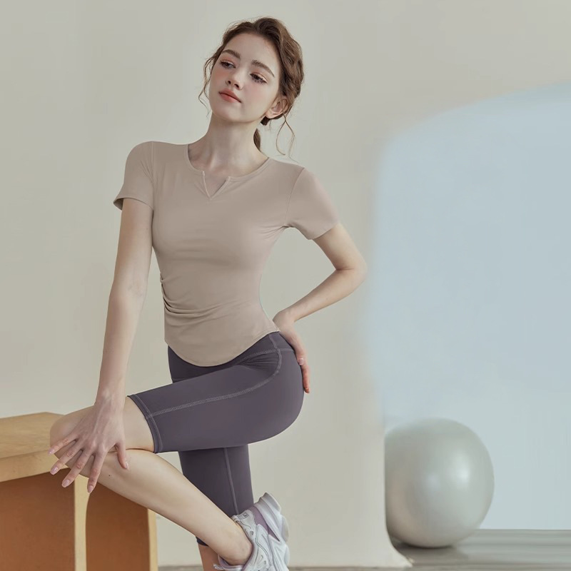 Top de yoga de adelgazamiento para mujeres entrenamiento profesional de Pilates de ejercicio rápido secado de mangas cortas fitness delgado verano