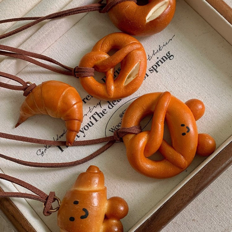 Cute Niche Design Alkaline Water Knot Bread Pendant Necklace for Women, Croissant Long Sweater Chain Accessory, Hoodie Chain