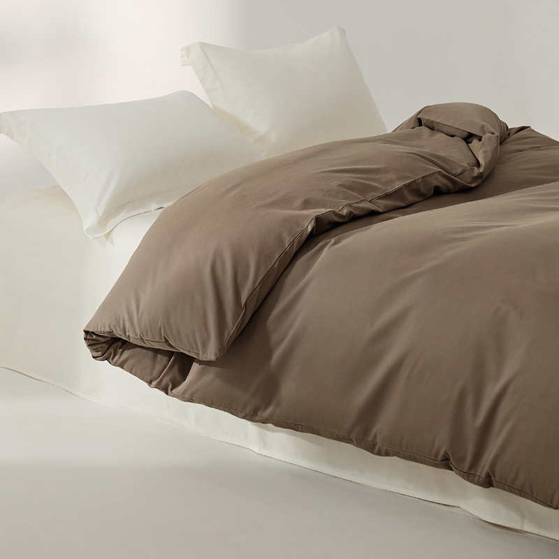 100本の純綿の毛磨き布団は秋冬に厚くて純色がシンプルです。