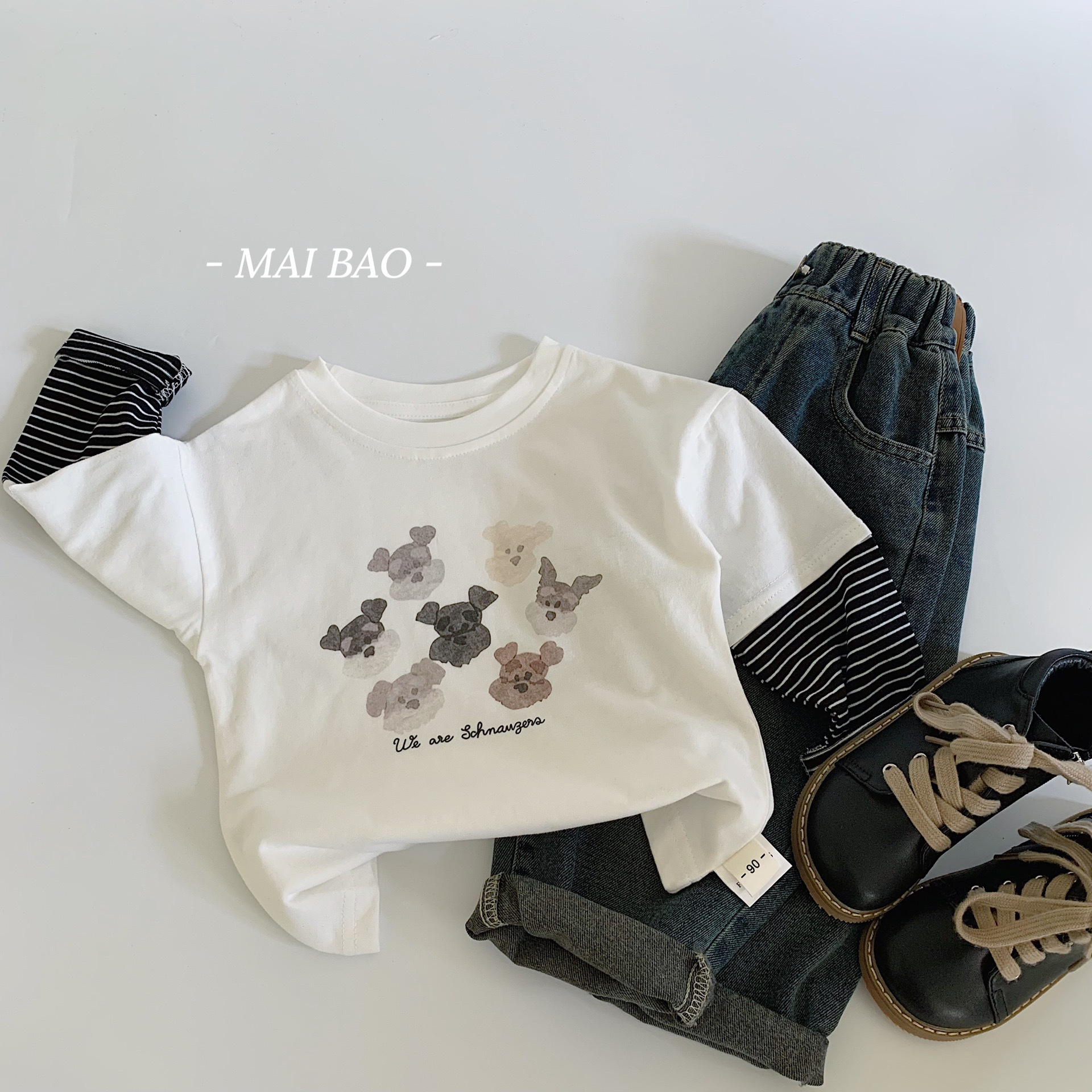 Camiseta infantil de Mai Bao2025 primavera nuevo estilo de niños y niñas de cuello redondo caricatura perrito falso dos piezas de camisa de base