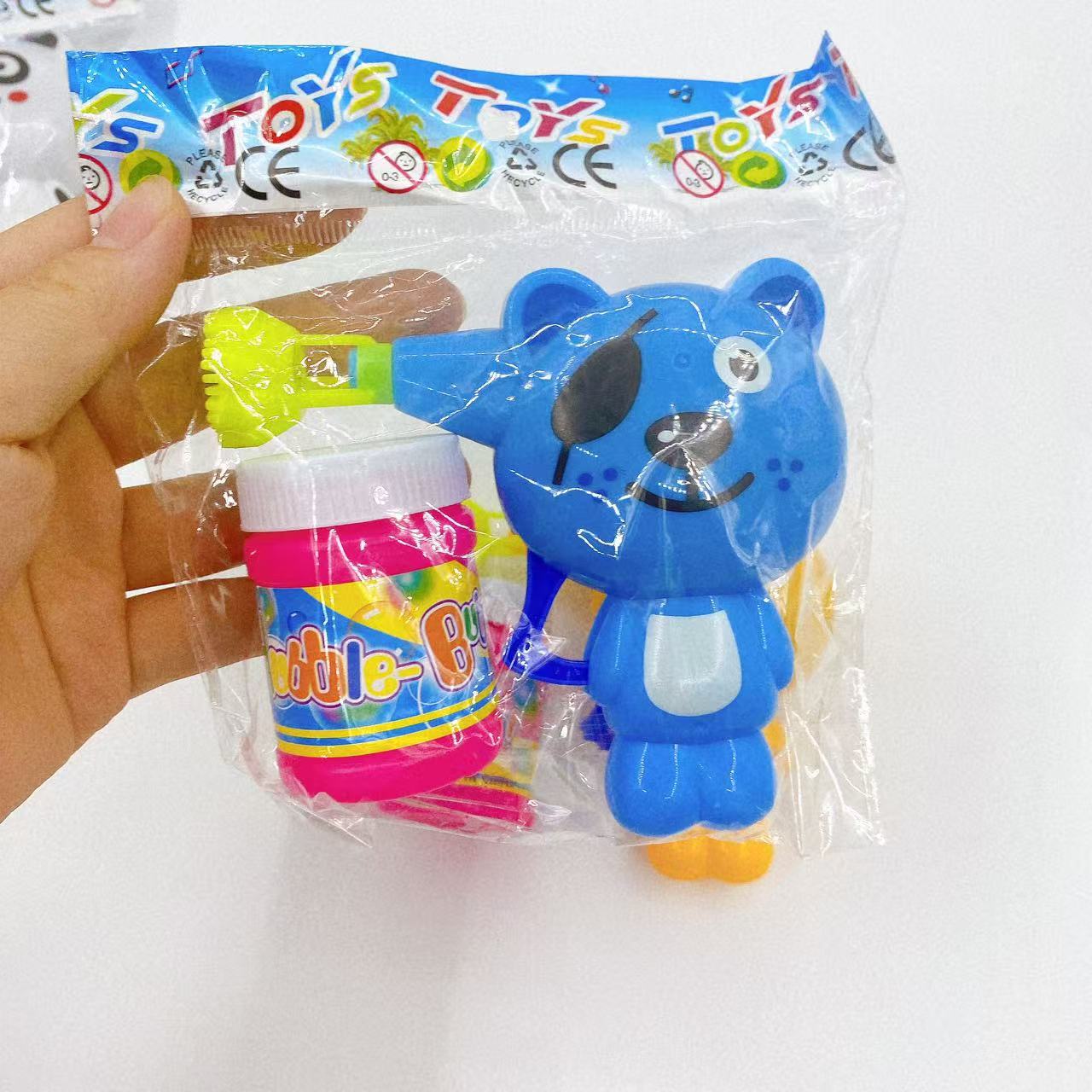 Pistola de burbujas manual para niños burbujas dibujos animados encantadores burbujas de agua juguetes tradicionales creativos máquina de burbujas al por mayor