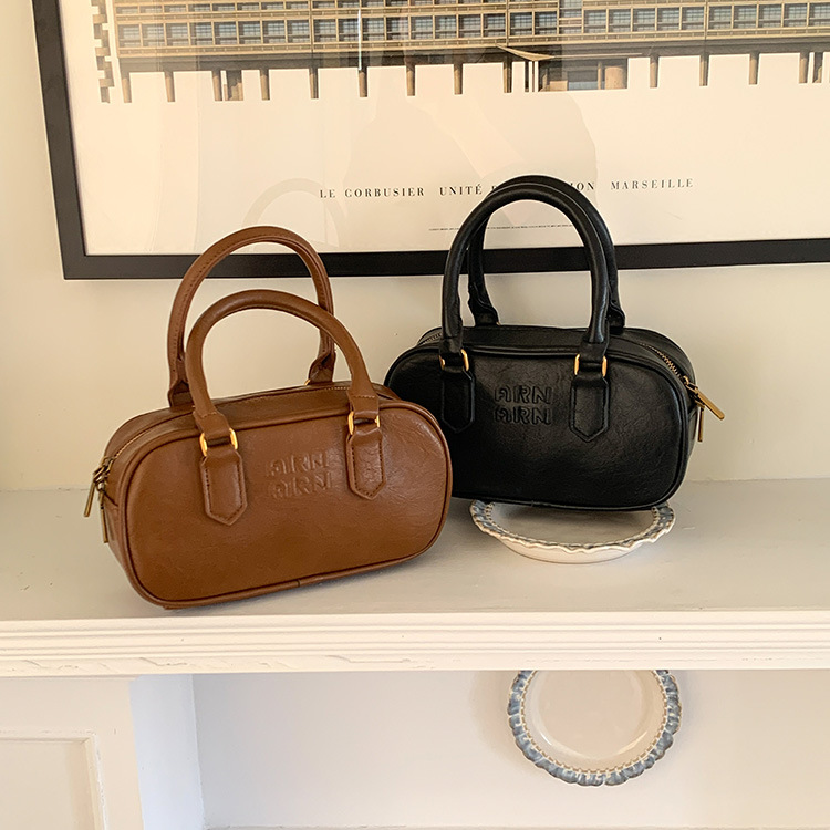 Bolsa de mujer de alto grado bolsa de mujer nicho nuevo bolso Retro bolsa de Boston Corea del Sur bolsa de mensajero del todo-fósforo