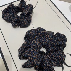 ファッション百合気質頭縄低馬尾豹紋髪縄頭飾りの緩み感があります。