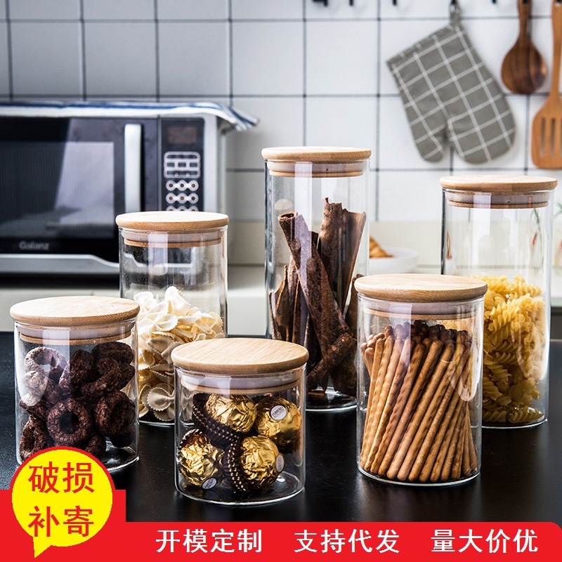 Fábrica al por mayor tarro de almacenamiento de vidrio de borosilicato tarro sellado tarro de té tarro de cubierta de bambú múltiples especificaciones tarro de caramelo
