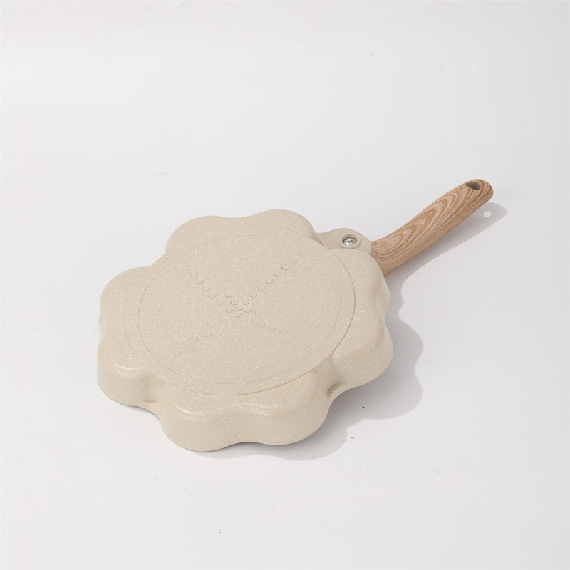 Piedra de arroz casera transfronteriza amor de cuatro agujeros panela de desayuno multifuncional para hamburguesas de tortilla antiadherente