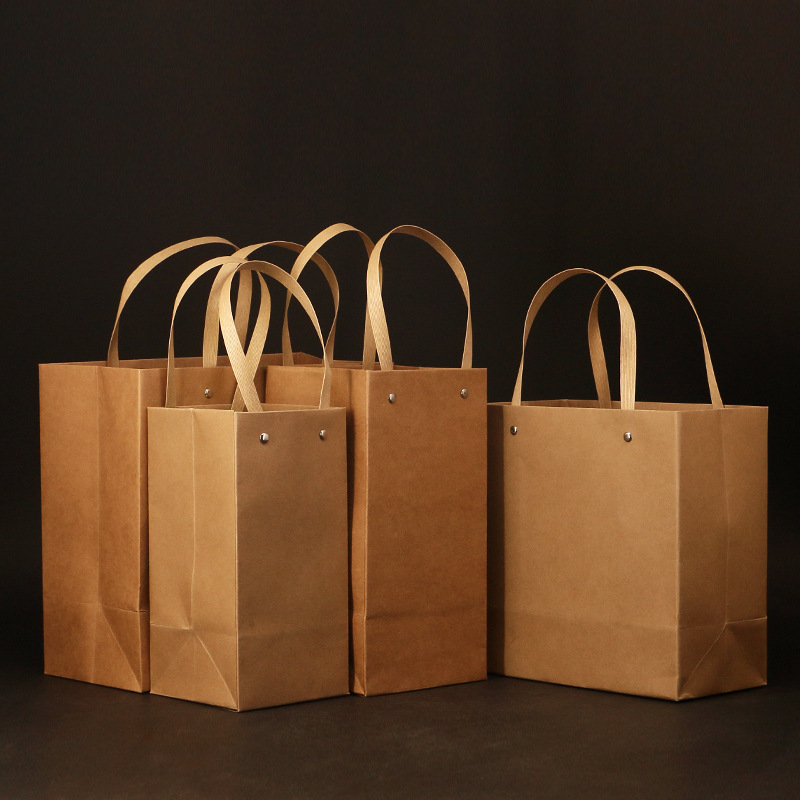 New-style kraft paper tote bags: disposable takeout packaging bags, gift bags, clothing shopping bags, and drawstring-handle totes.