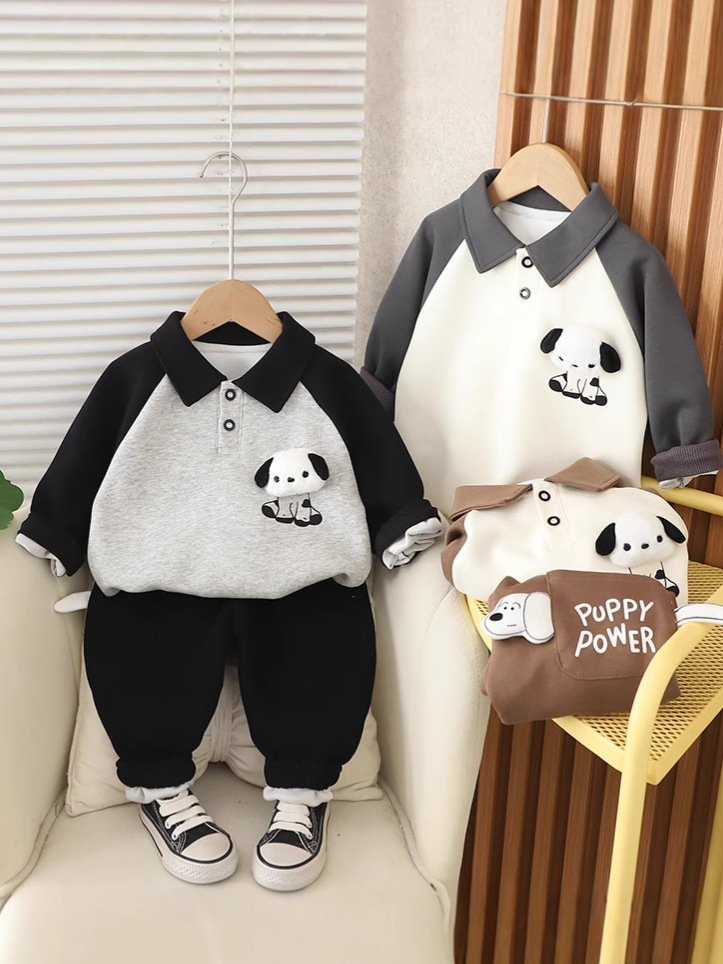 Niños primavera y otoño con collar conjunto 2025 nuevo estilo de aire extranjero ropa de primavera infantil dibujos animados polo suéter dos piezas conjunto