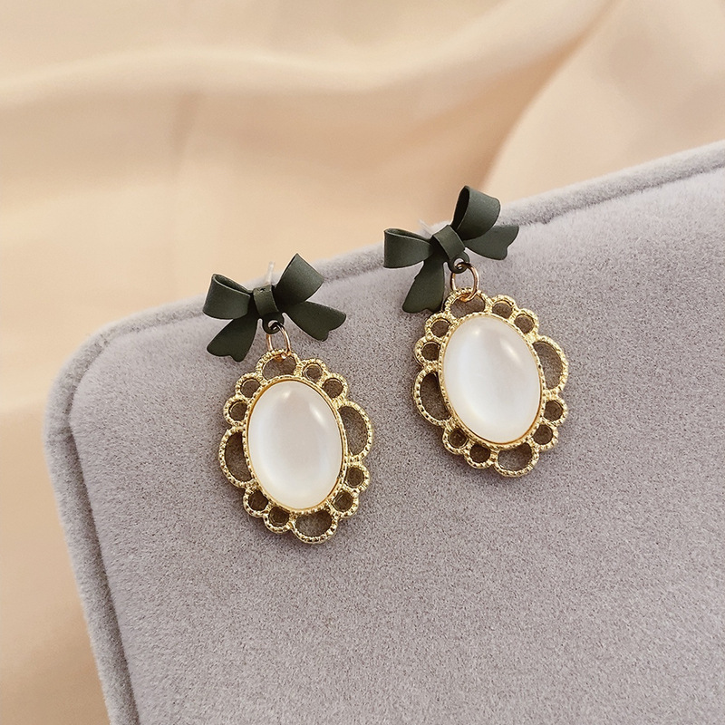 Pendientes de perlas, pendientes de estilo caliente, lujo ligero, pendientes simples de celebridades de Internet, accesorios de Yiwu, venta al por mayor